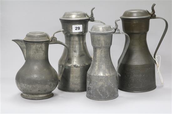 Three 18th century Scottish pewter tappit hens and a pewter lidded baluster jug